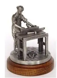 Timmerman met schaaf