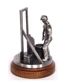 Metselaar beeldje tin